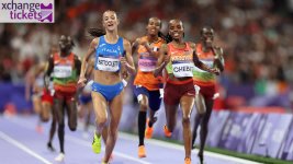 Olympic athletes running track competition.jpg